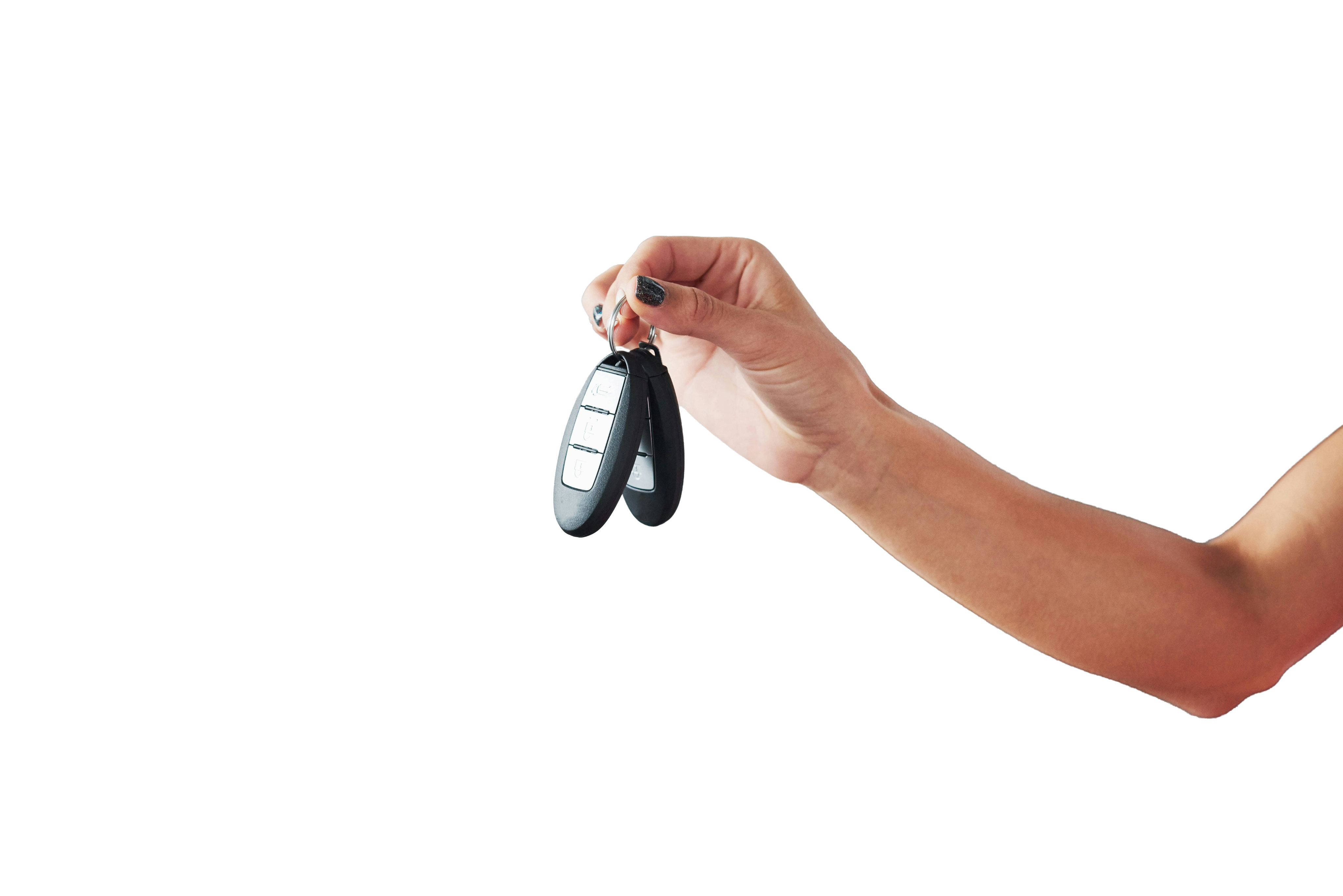 Hand holding car keys