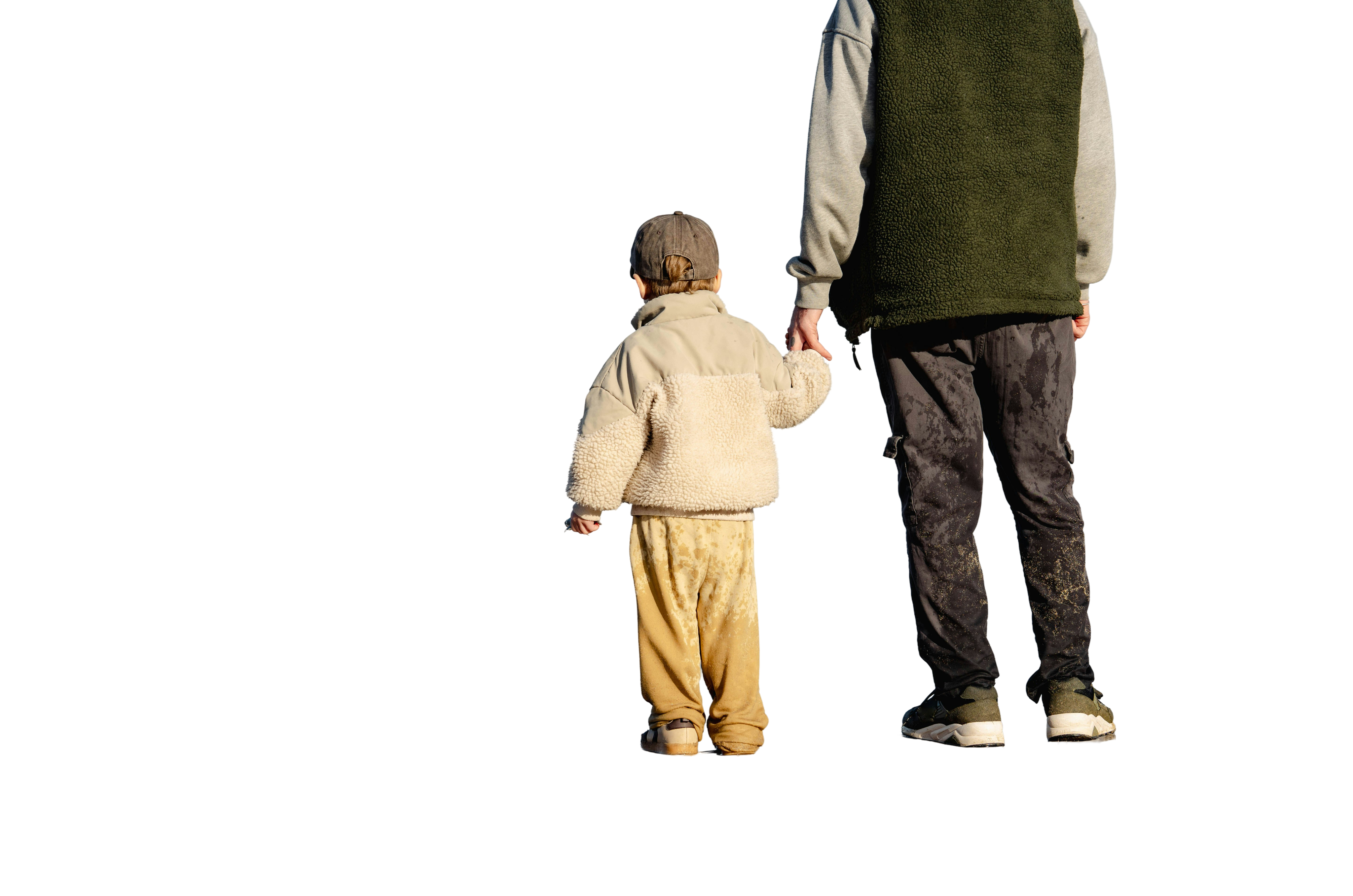 A child holding a parent’s hand